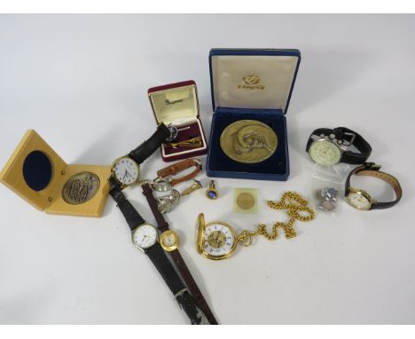Mixed lot to include a Rotary Mechanical Skeleton pocket watch in running order, various wristwatches, medallions.