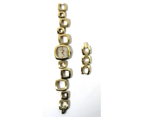 Ladies 'Fossil' Quartz watch with Gold Tone body and Strap with spare links. Comes with Original Tin and instruction manual. 