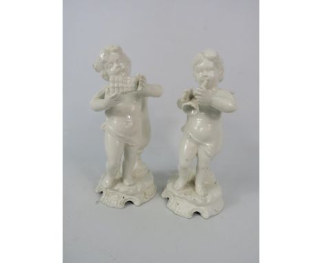 A pair of Vintage Italian white porcelain Cherub spill vases, 8" tall.