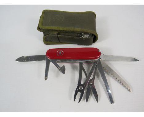 Victorinox swiss army knife with case.