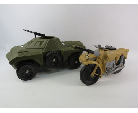Vintage Action man Armoured scout vehicle and a Cherilea German motorcycle with side car.