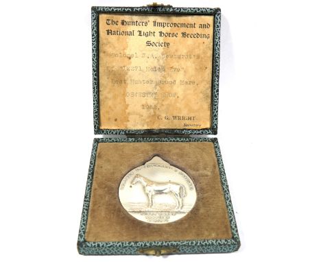Hunters Improvement and Light Horse Breeds Society Medal awarded 1962 with original velvet lined box. Medal measures approx 4