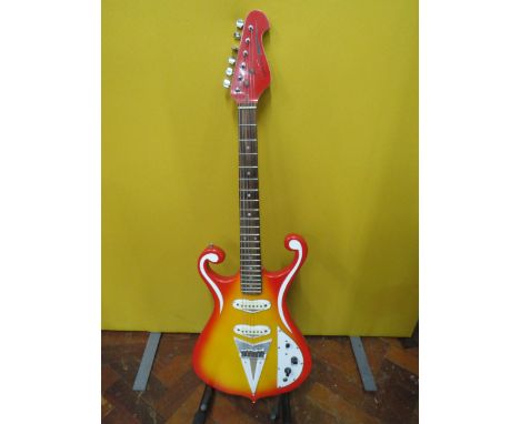 Solid Bodied Six String Electric Guitar  in fair condition with light wear.  41 inches long. 3.2g. All pick ups work and good