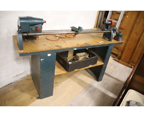 Very large Woodworking lathe with Clarke Motor and 54 inch Bed.  H:47 x W:68 x D:21 inches. In good working order with chucks