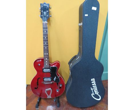 Vintage Contessa EKO  Electric Accoustic Six String Guitar. Finished in Grained cherry style wood some signs of use, wear and