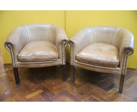 Pair of Leather Tub chairs in light use condition. See photos