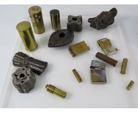 Various metal detecting finds including lighters, lipstick cases  etc and 2 antique ceramic oil lamps.