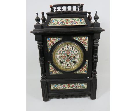 Very Pretty Ceramic decorated Mantle or Bracket clock. In running order with pendulum and key. May need superficial repairs t