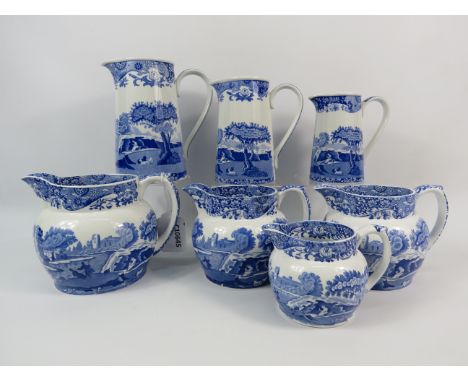 Two sets of Spode Italian Graduated jugs, the tallest measures 6.5".
