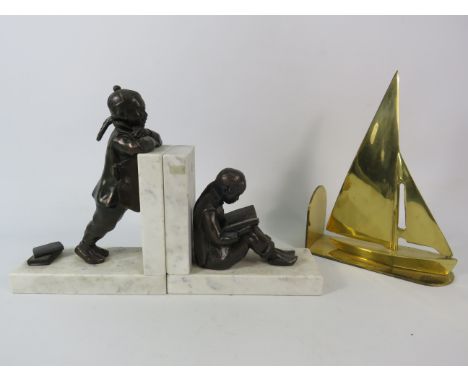 Pair of Bronze figural marble bookends depicting chinese children students plus a single brass boat bookend.