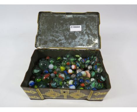 Vintage Thornes Toffee tin containing a quantity of marbles and steelies.
