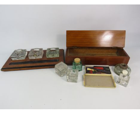 Vintage inkwell pen rest desk tidy plus a wooden pen box and selection of various inkwells and a wax seal set.
