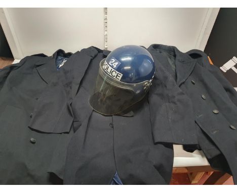 A selection of Police clothing including riot helmet etc 