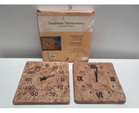 A sandstone garden thermometer and wall clock 