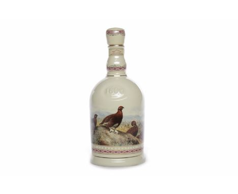 FAMOUS GROUSE CENTENARY DECANTER 1896-1996Blended Scotch Whisky.70cl, 40% volume, in Wade porcelain decanter.     CONDITION R