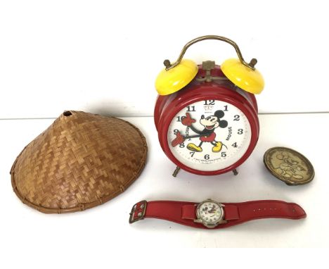 A Mickey Mouse wristwatch, a Mickey Mouse buckle, a Mickey Mouse alarm clock, assorted Disney soft toys, a felt Kermit the Fr