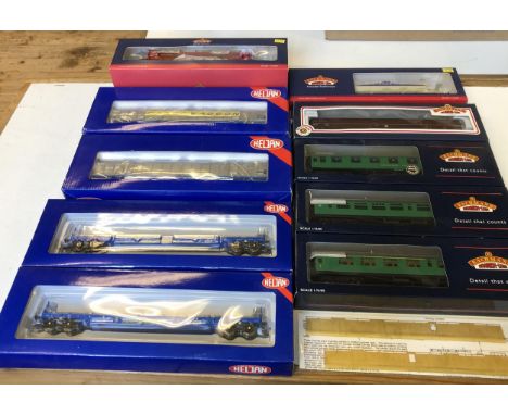 An OO gauge Bachmann carriage, 39-253,  34-575A, 34-550B, 34-654, 38-212, and 38-250, all boxed, and OO gauge Heljan rolling 