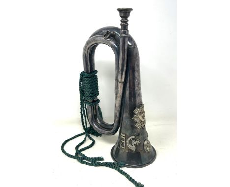 A Boosey & Hawkes silver bugle, with HLI badgesA little worn and several dents, with a mouthpiece 