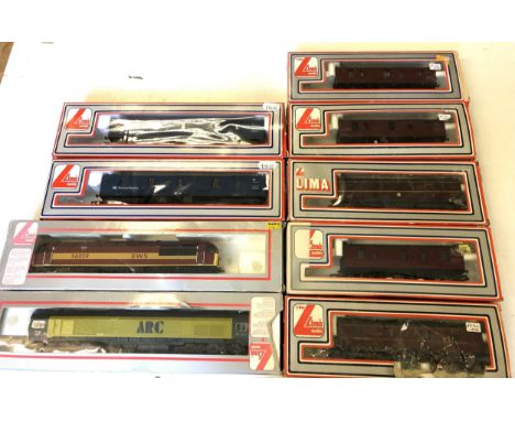 An OO gauge Lima locomotive, another, assorted Lima rolling stock and carriages, No 30656W, 305656W, 305357W, 305337W, 305358