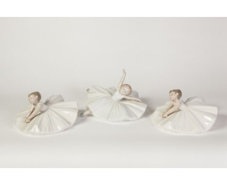 THREE NAO, SPANISH PORCELAIN FIGURES OF YOUNG BALLERINAS, 5 1/4" (13.3cm) high approx, printed marks (3) 