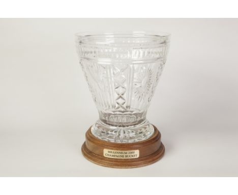 IMPRESSIVE WATERFORD CUT GLASS MILLENNIUM CHAMPAGNE BUCKET on turned wood stand, 12 1/2" (31.8cm) high overall, in original b