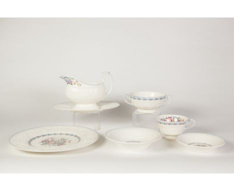 SEVENTY SEVEN PIECE WEDGWOOD PATRICIAN 'MORNING GLORY' MOULDED POTTERY PART DINNER AND TEA SERVICE, originally for eight pers