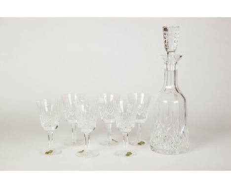 WATERFORD CUT GLASS DECANTER AND STOPPER AND A SET OF SIX MATCHING WINE GLASSES, the decanter 13" (33cm) high, the glasses 5 