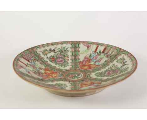 LATE 19th CENTURY CHINESE CANTON DECORATED SHALLOW DISH with figural and floriated panels in famille rose enamels divided y f