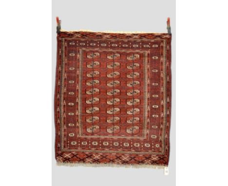 Two Tekke Turkmen rugs, Turkmenistan, about 1930-40s, the first 4ft. 6in. x 3ft. 8in. 1.37m. x 1.12m. Remnants of glue all ed