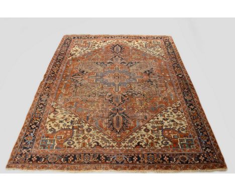 Heriz carpet, north west Persia, first quarter 20th century, 12ft. 10in. x 9ft. 9in. 3.90m. x 2.97m. ‘Bite’ to left side bord