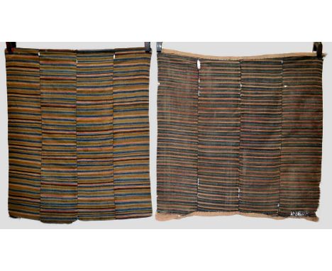 Two Tibetan women’s finely woven woollen dress aprons, late 19th/early 20th century, the first with soft blue, pink, dark and