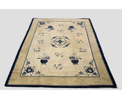 Attractive Chinese carpet, Beijing, first quarter 20th century, 11ft. 7in. x 9ft. 3in. 3.53m. x 2.82m. Slight wear in places;