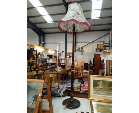 A mahogany standard lamp. COLLECT ONLY.