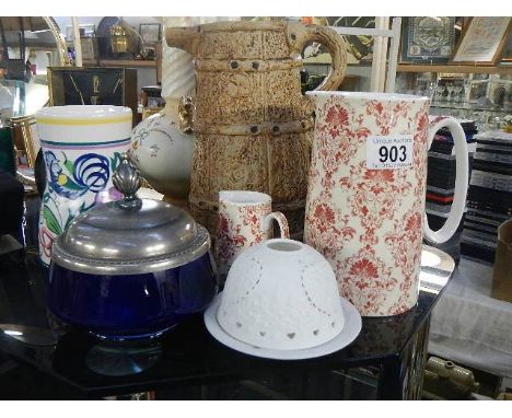 A Poole pottery vase and a quantity of jugs, COLLECT ONLY.