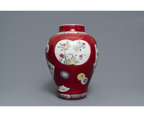 Full title: A fine Chinese famille rose ruby ground baluster vase with floral panels, Yongzheng------- Description: H.: 34,5 