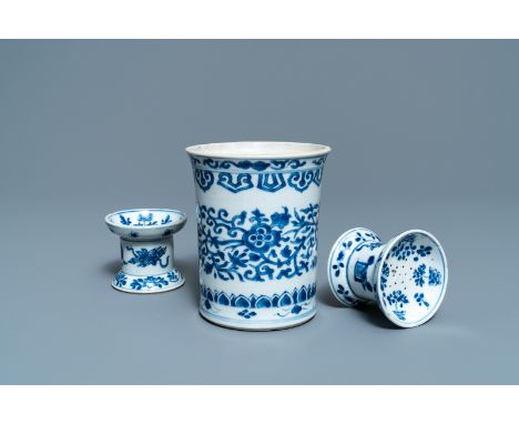 Full title: A Chinese blue and white brush pot and a pair of sanders, Kangxi------- Description: H.: 13 cm (the brush pot) --