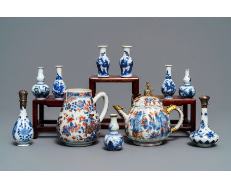 Nine Chinese blue and white miniature vases, an 'Amsterdams bont' teapot and a milk jug, Kangxi and laterL.: 14 cm - H.: 12 c