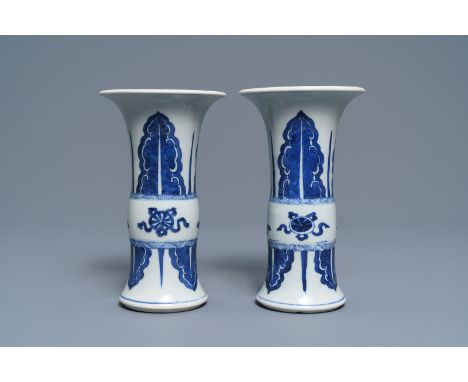 Full title: A pair of Chinese blue and white 'gu' vases, Kangxi------- Description: H.: 19 cm