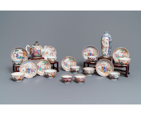 Full title: Eleven Chinese famille rose 'mandarin' cups, eight saucers, a teapot and a vase, Qianlong------- Description: H.: