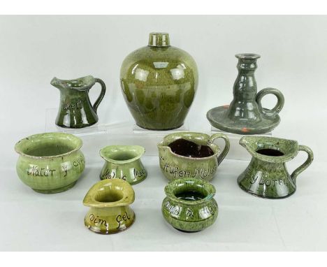 GROUP OF EWENNY POTTERY IN GREEN GLAZE includes olive green bottle vase, candlestick, small jugs etc (9)Provenance: collectio
