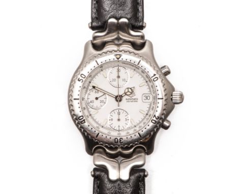 A GENTLEMAN'S STAINLESS STEEL WRISTWATCH, TAG HEUER reference number: CG 2110-RO, automatic, the circular white dial with lum