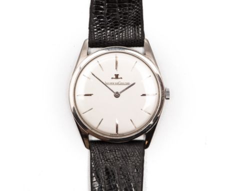 A GENTLEMAN'S 18CT GOLD WRISTWATCH, JAEGER-LECOULTRE manual, the circular silvered dial, applied with baton hour markers, on 