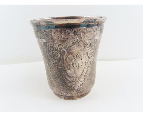 A French 19th century beaker, with engine turned decoration, monogrammed cartouche, 8cm high, 71 g (2.2 troy ozs) gross