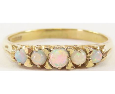 A 9 carat gold five stone opal dress ring, finger size L, 1.6 g gross