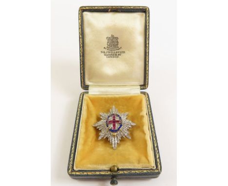 A ruby, diamond and enamel Coldstream Guards sweetheart brooch, 3.6 cm by 3 cm, 7.7 g gross, tests as 18-22ct gold,  in assoc