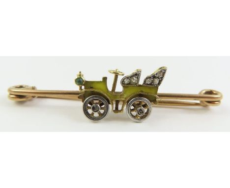 A rose cut diamond and yellow enamel car brooch, 4.4 cm long, 3.1 g gross, cased 
