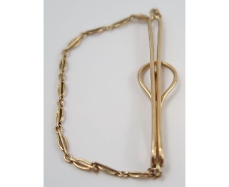 A 9 carat gold chain tie slide, 4.4 g gross