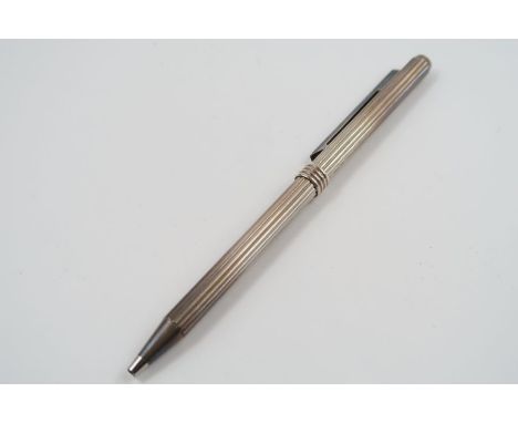 A Christian Dior ballpoint pen, with French ‘Ant’ control marks, in original fitted case and with booklet and guarantee card