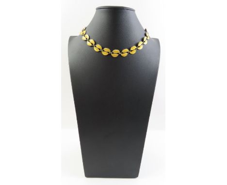 A David Andersen yellow enamel necklace, the links in the form of two leaves, marked 'D-A 925S Sterling Norway', 37cm long