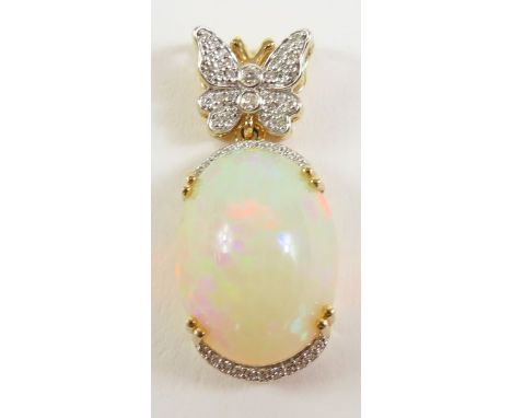 An 18ct gold Ethiopian opal and diamond pendant, the oval opal measuring 13.75mm x 18.5mm, 10.5ct surmounted by a diamond set